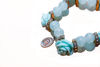 Imagen de Plastic pearl and rose beads bracelet with Our Lady medal