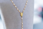 Picture of Pearl Gold Rosary