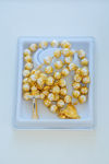 Picture of Gold-colored crystal rosary